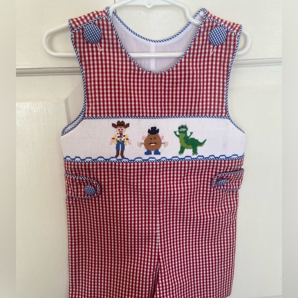 Toy Story smocked John John, red gingham. 18m